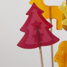 Un cadeau qui enchantera petits et grands : une sucette sapin de Noël.