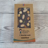 Tablette de chocolat noir (61% de cacao minimum) mendiant.